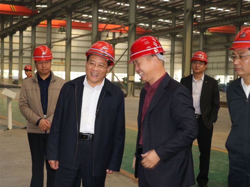 王克明與省工商聯(lián)黨組書記李德才親切交談